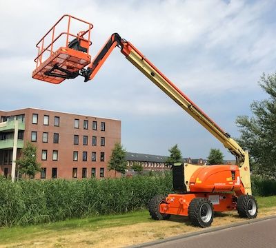 Almere, the Netherlands - July 6, 2018: JLG 800AJ Articulating Boom Lift standing by the side of the road.